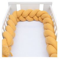 Ochraniacz do łóżeczka warkocz muślinowy New Baby musztardowy