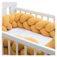 Ochraniacz do łóżeczka warkocz muślinowy New Baby musztardowy