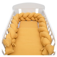 Ochraniacz do łóżeczka warkocz muślinowy New Baby musztardowy