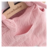 Ogrodniczki muślinowe dla niemowląt New Baby Soft dress różowy